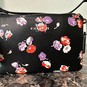 NWT Coach floral wristlet  in saffiano leather-THIS IS ACTUALLY A Wristlet.